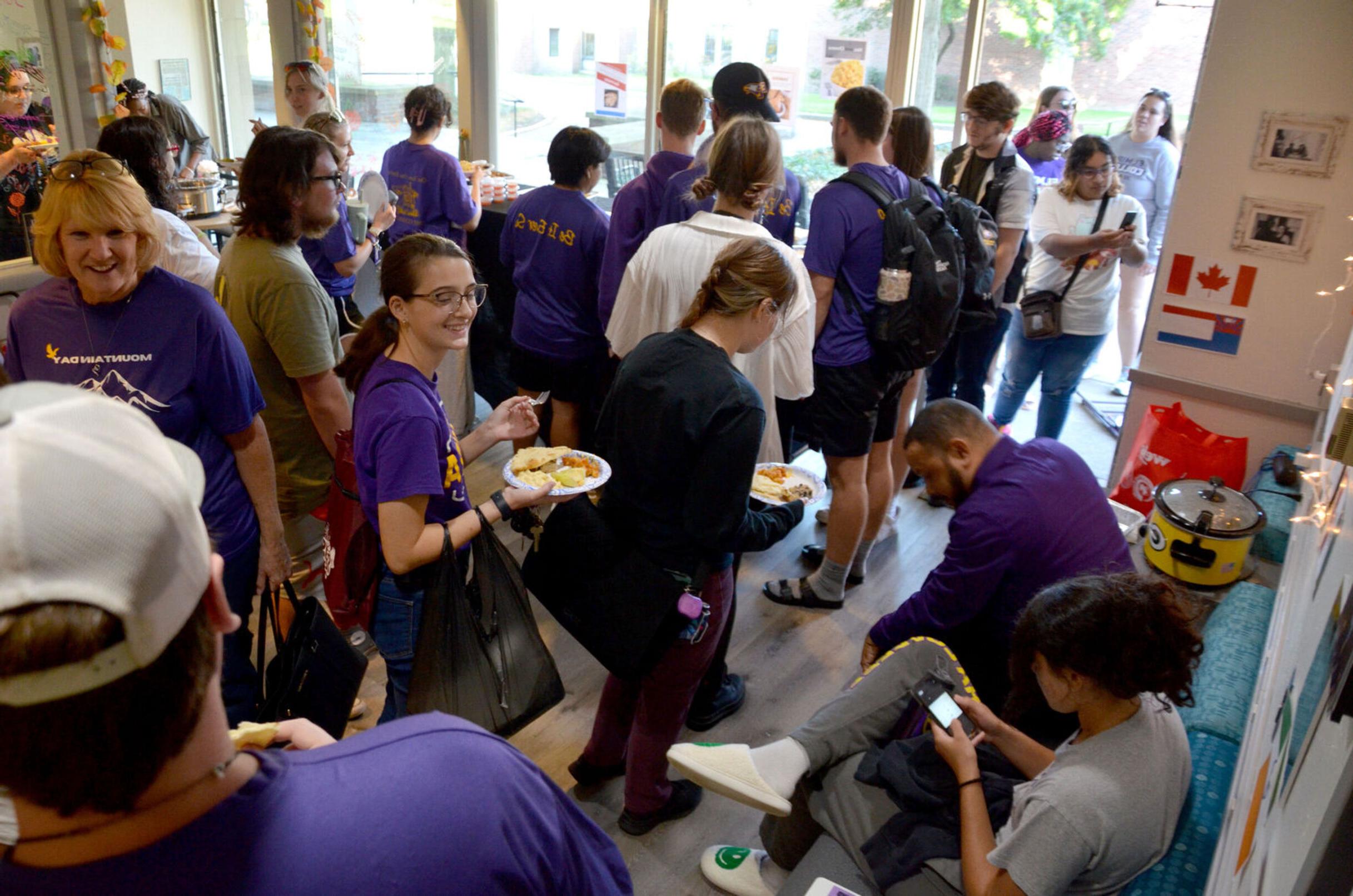 Students crowd the IDEA center for the Taste of Home event